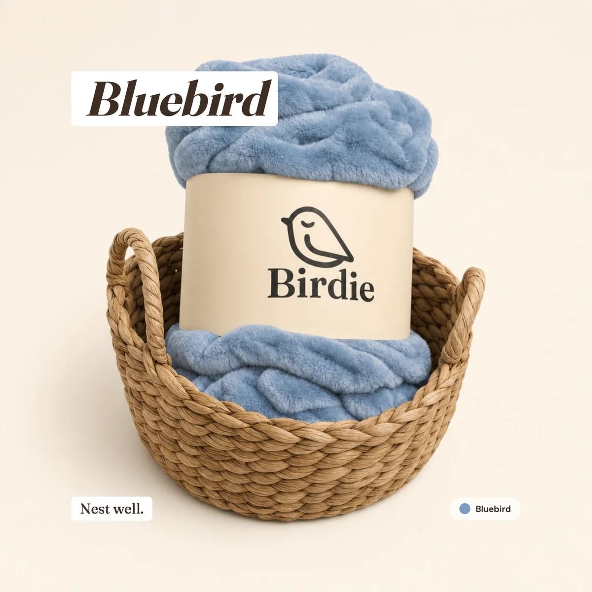 Gift-ready Bluebird blanket in a woven basket
