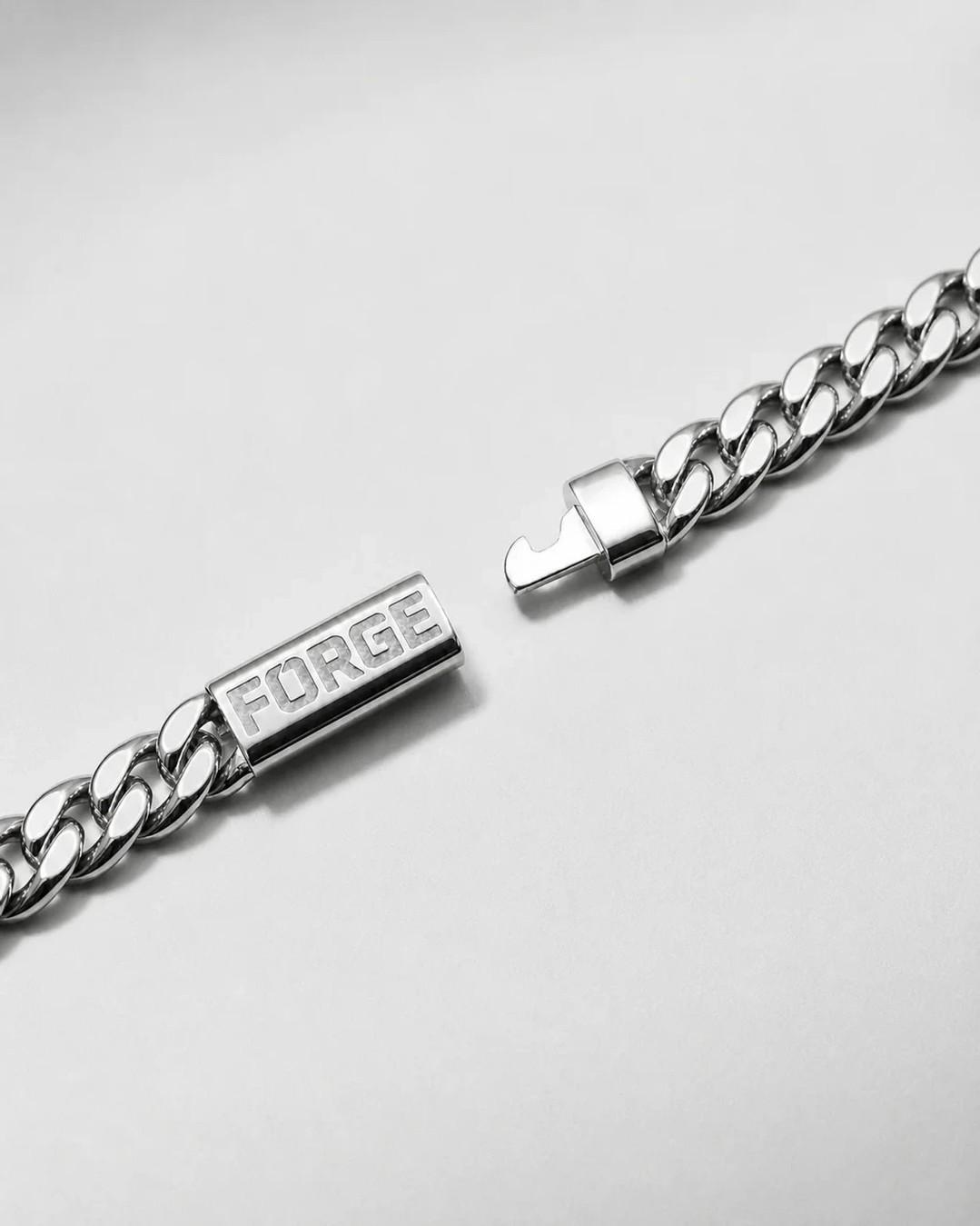 Bonded white gold PVD on 316L steel.