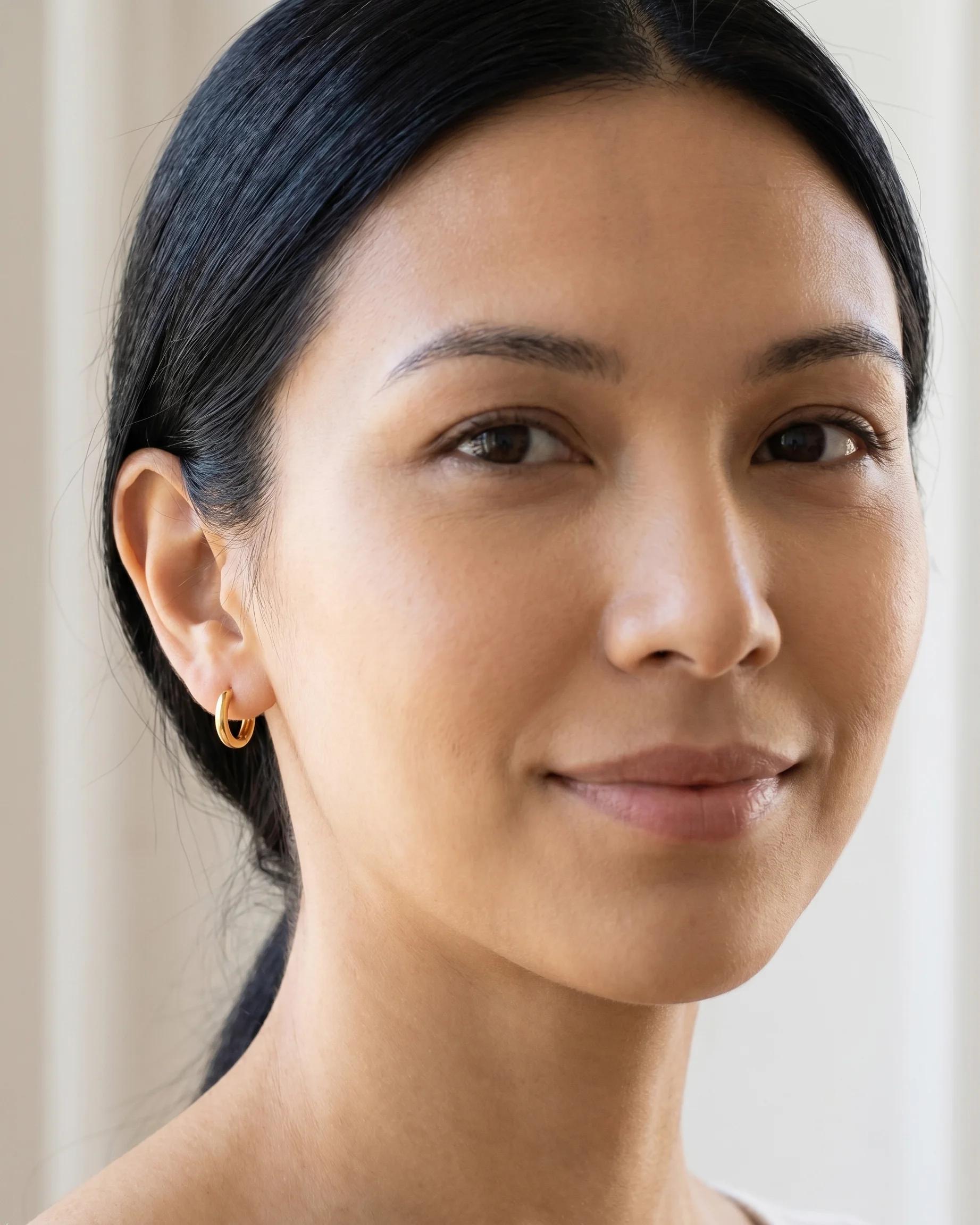 Lune Huggie Hoops Medium — Styled model