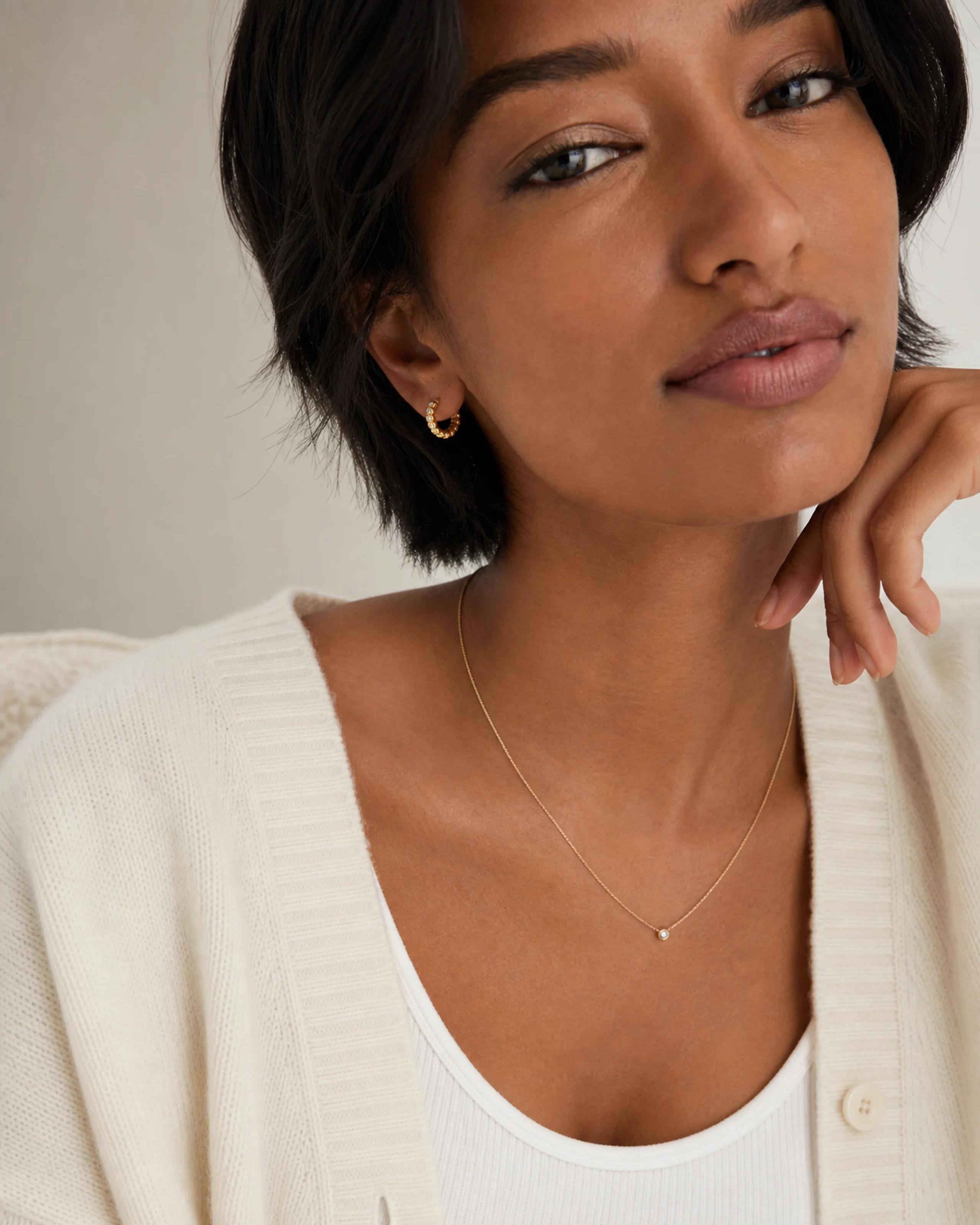 Lune Pavé Huggies Small — Styled model