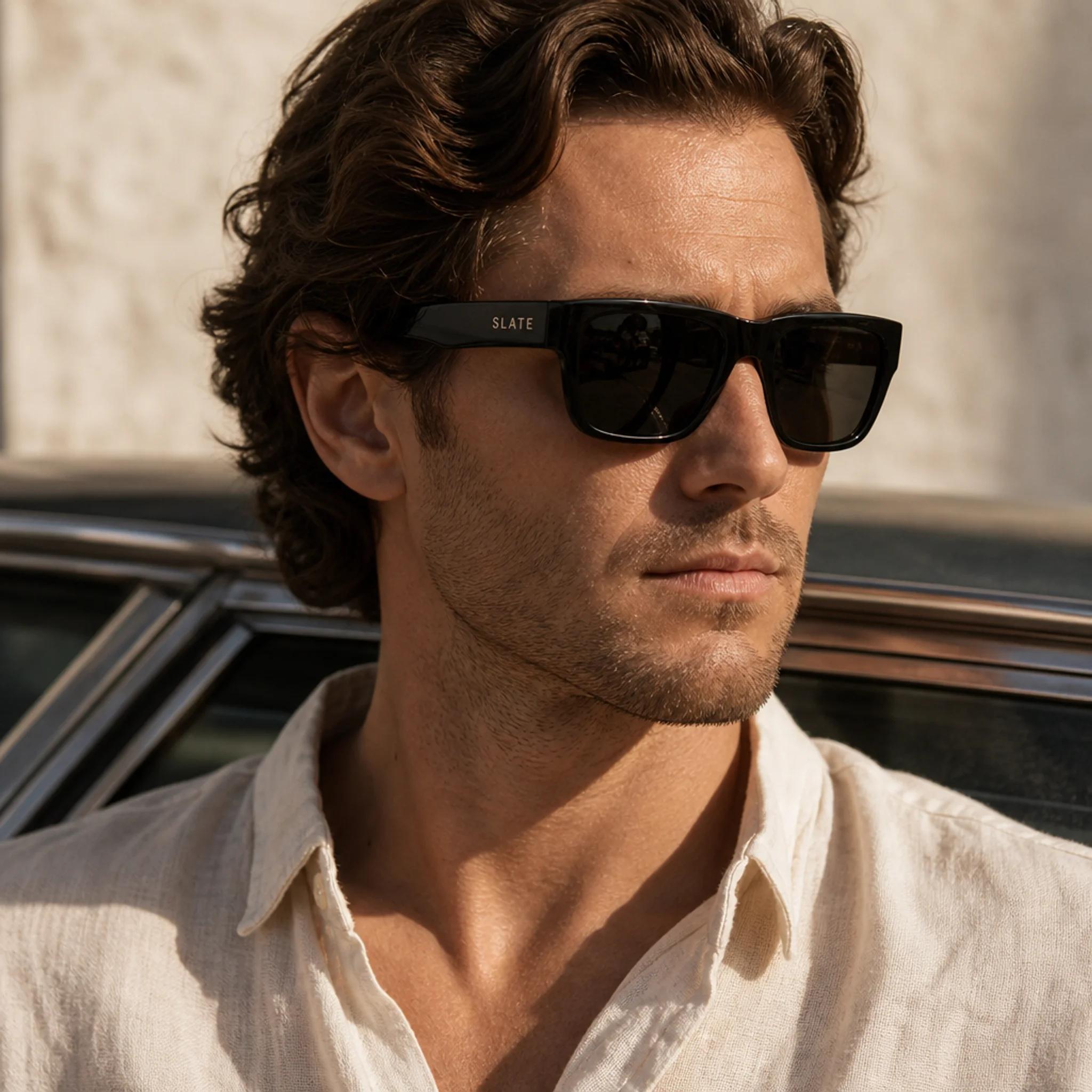Man wearing Slate Basin sunglasses on a New York City subway