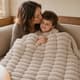 Cream Birdie blanket in a family room